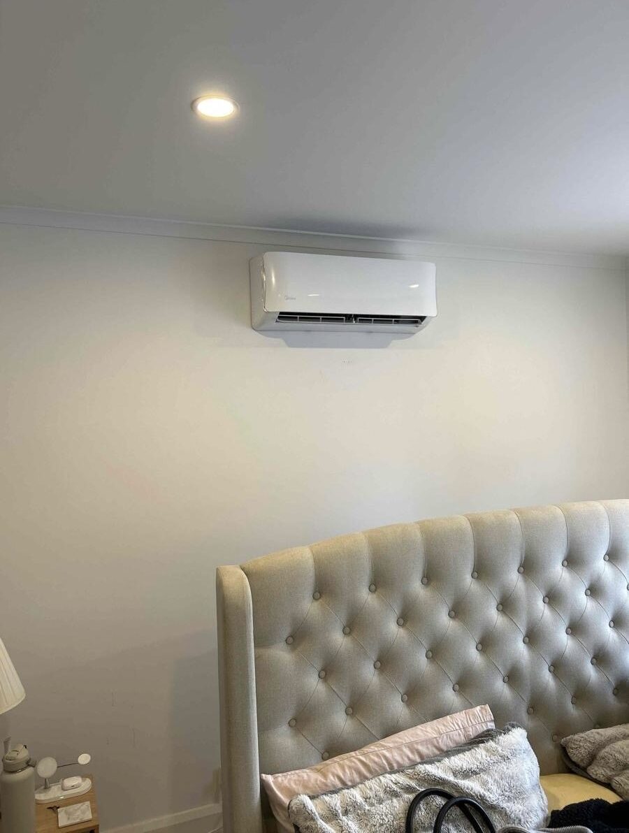 Midea indoor split in elegant bedroom